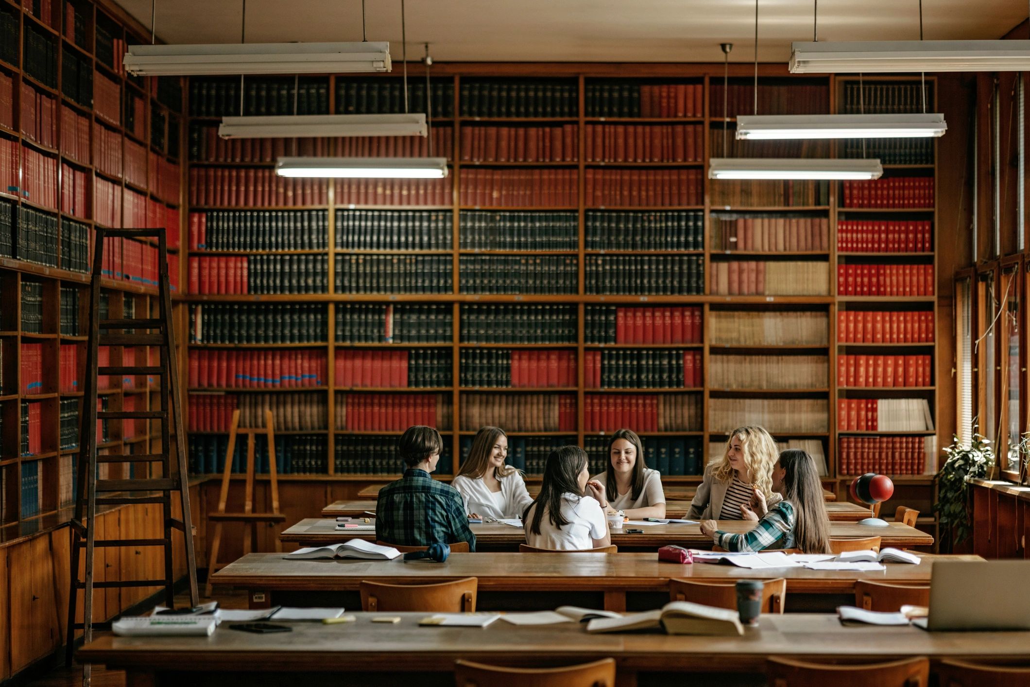 Students studying together in a library