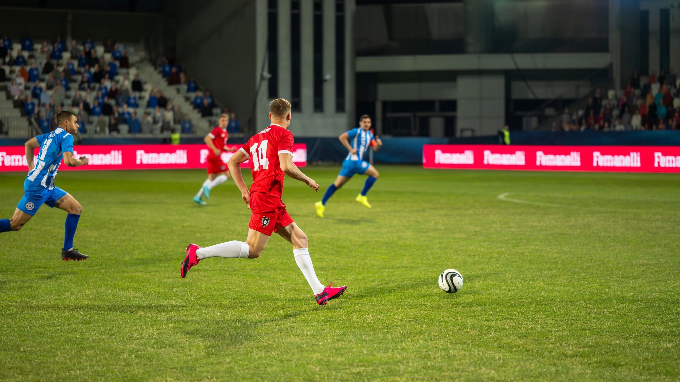 Soccer players competing during a match