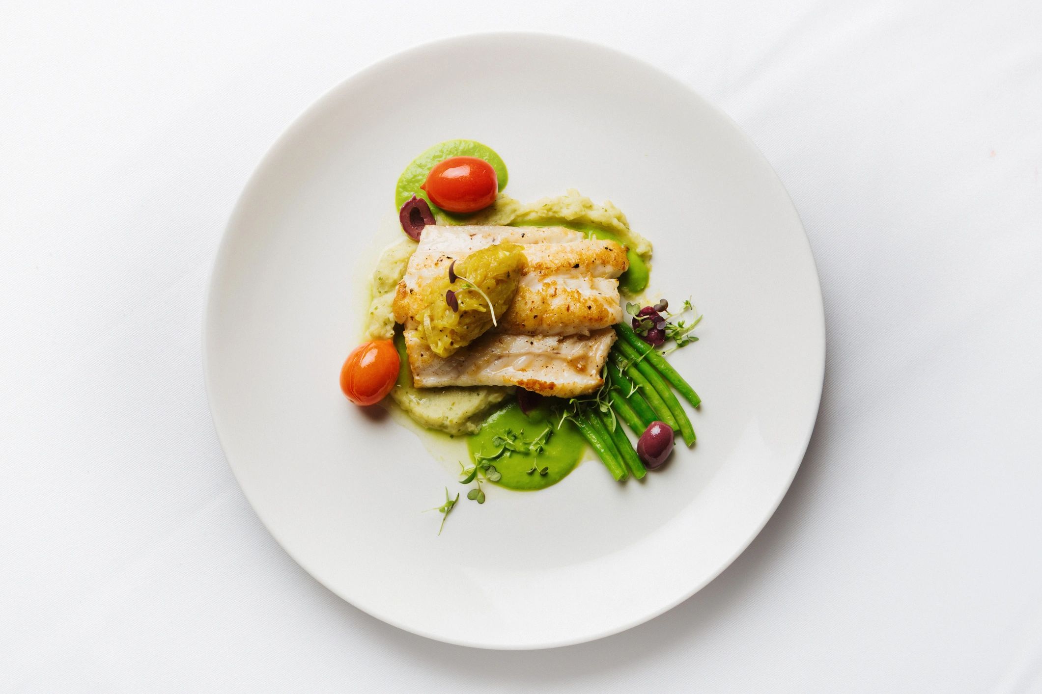 Grilled fish plated in a fine restaurant