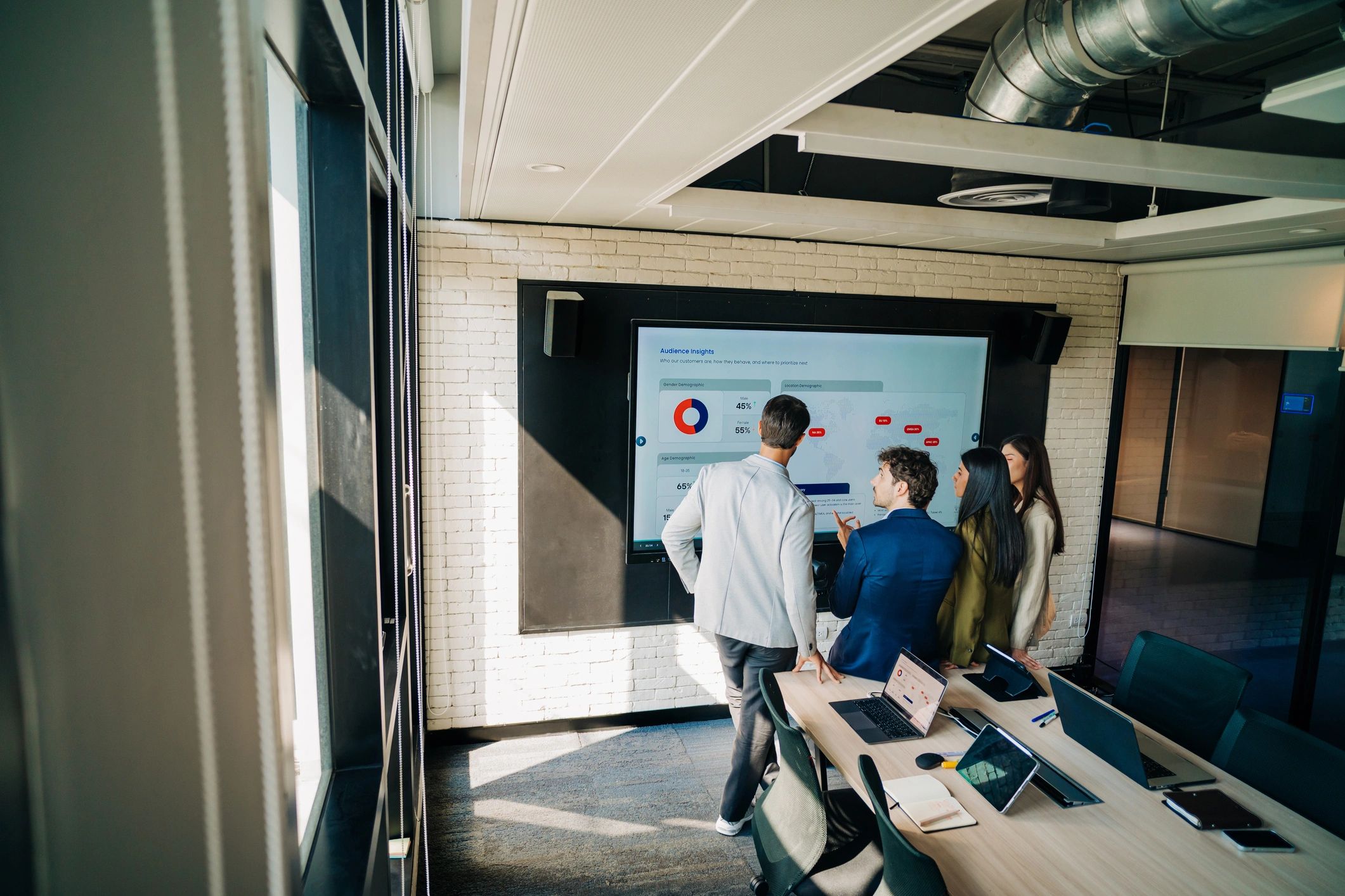 Business team reviewing analytics in a modern office